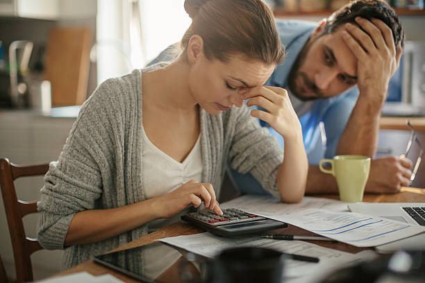 Photo of a couple going through  financials problems